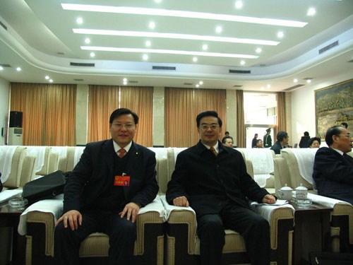 王董與最高人民法院院長、原湖南省省長周強在一起